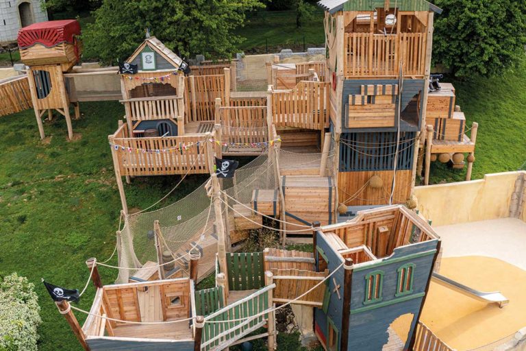 Colour photo as arial shot of wooden adventure playground at Festyland theme park